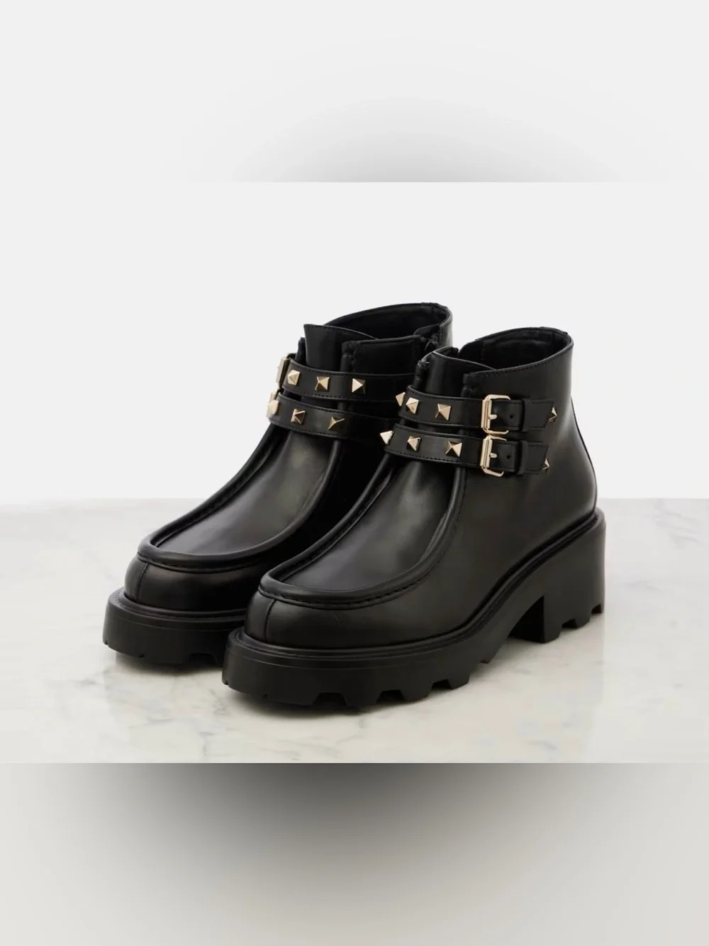 Valentino Garavani Black Leather Lug-Sole Ankle Boots with Studded Double Straps